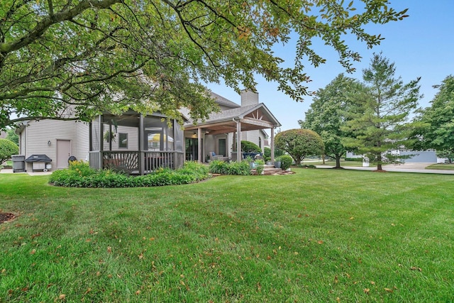 507 Cambridge Ln, Shorewood, IL 60404 - view of green lawn with a sunroom and ceiling fan