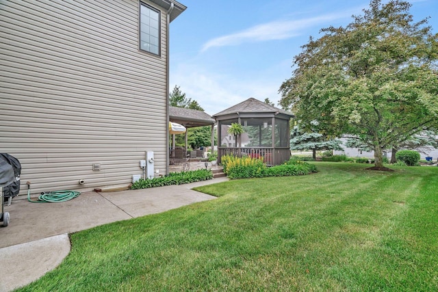 507 Cambridge Ln, Shorewood, IL 60404 - view of green lawn featuring a patio area, a gazebo, and a sunroom