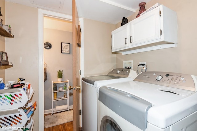 120 Presidential Blvd, Oswego, IL 60543 - laundry room with cabinet space, washing machine and clothes dryer, dark wood-style floors, and baseboards