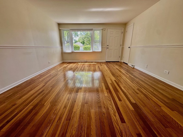 319 Triggs Ave, Elgin, IL 60123 - spare room with hardwood / wood-style floors and baseboards