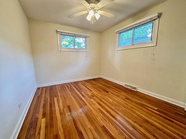 319 Triggs Ave, Elgin, IL 60123 - spare room featuring hardwood / wood-style flooring and a ceiling fan