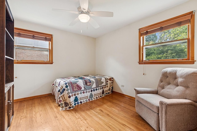3918 213th Pl, Matteson, IL 60443 - bedroom with light wood finished floors, baseboards, and ceiling fan