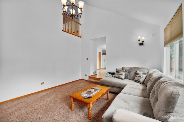 2912 Indian Springs Ct, Joliet, IL 60435 - living area with a chandelier, carpet floors, baseboards, and high vaulted ceiling