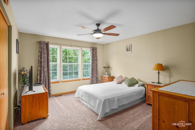 2912 Indian Springs Ct, Joliet, IL 60435 - carpeted bedroom with baseboards and a ceiling fan