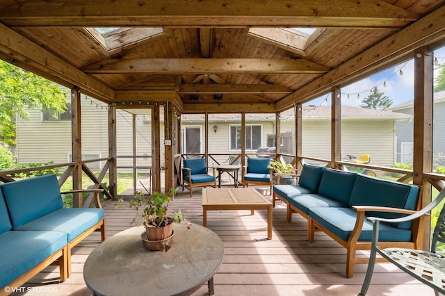 7404 Wooded Shore Dr, Wonder Lake, IL 60097 - sunroom featuring a skylight and an outdoor living space