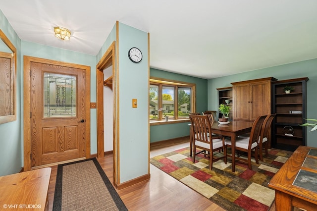 7404 Wooded Shore Dr, Wonder Lake, IL 60097 - entrance foyer with wood finished floors and baseboards