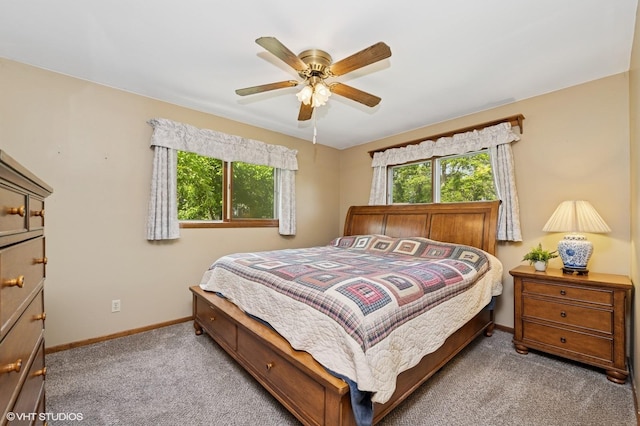 7404 Wooded Shore Dr, Wonder Lake, IL 60097 - carpeted bedroom featuring baseboards and a ceiling fan
