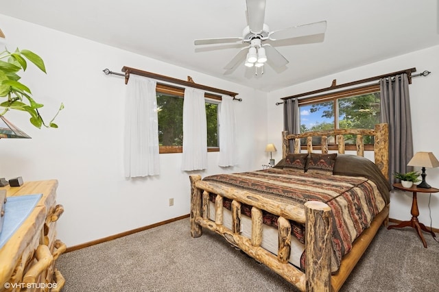 7404 Wooded Shore Dr, Wonder Lake, IL 60097 - carpeted bedroom featuring baseboards and a ceiling fan