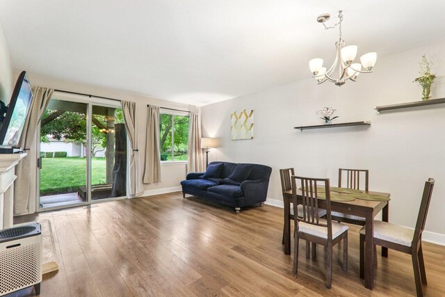 3032 Kentshire Cir, Naperville, IL 60564 - dining space featuring wood finished floors and a chandelier