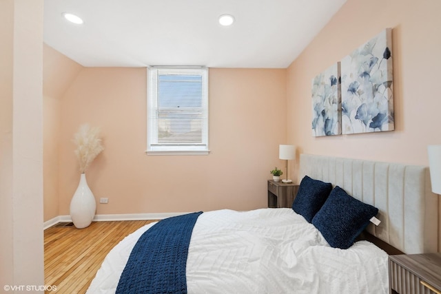 2542 N Long Ave, Chicago, IL 60639 - bedroom featuring wood finished floors, recessed lighting, and baseboards