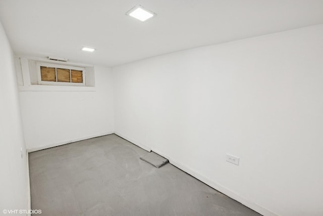 2542 N Long Ave, Chicago, IL 60639 - spare room with concrete flooring and baseboards