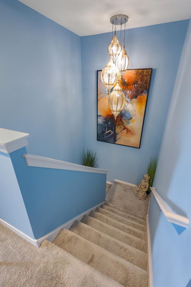 2034 Link Dr, Buffalo Grove, IL 60089 - stairs featuring carpet floors and baseboards