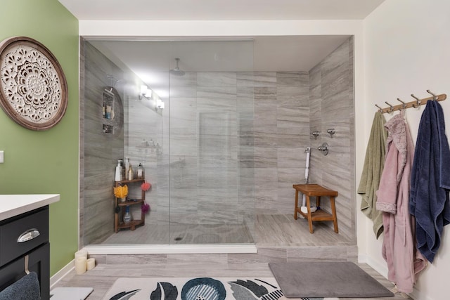 2034 Link Dr, Buffalo Grove, IL 60089 - bathroom featuring vanity, a walk in shower, and baseboards
