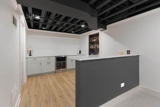 2034 Link Dr, Buffalo Grove, IL 60089 - indoor bar featuring wine cooler, light wood-style flooring, and baseboards