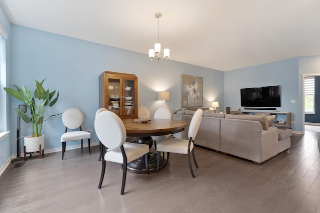 2034 Link Dr, Buffalo Grove, IL 60089 - dining room featuring wood finished floors, a chandelier, and baseboards