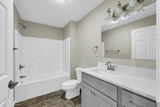 207 E Fairfield St, Fisher, IL 61843 - bathroom with vanity, toilet, and shower / bathtub combination