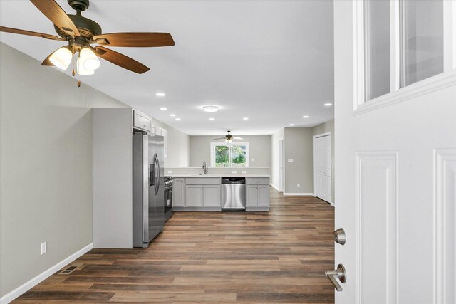 207 E Fairfield St, Fisher, IL 61843 - kitchen featuring appliances with stainless steel finishes, a ceiling fan, dark wood finished floors, recessed lighting, and light countertops