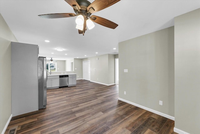 207 E Fairfield St, Fisher, IL 61843 - unfurnished living room featuring a ceiling fan, dark wood finished floors, baseboards, and recessed lighting