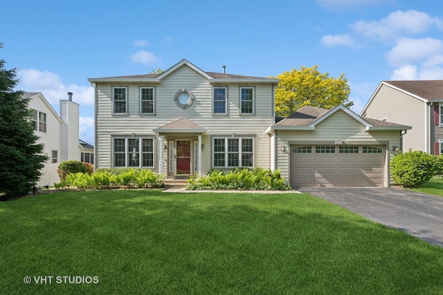 1149 Saddle Ridge Trl, Cary, IL 60013 - view of front of property with driveway, a garage, and a front lawn