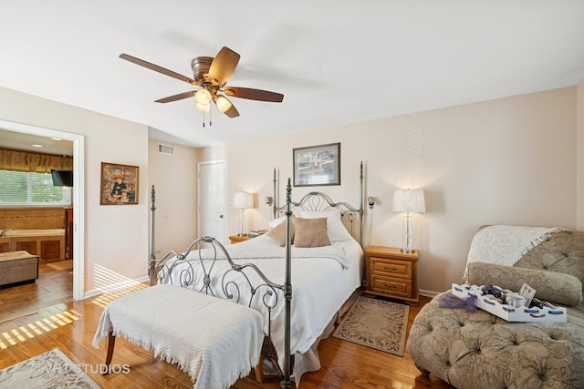 1149 Saddle Ridge Trl, Cary, IL 60013 - bedroom with wood-type flooring, ensuite bath, baseboards, and a closet