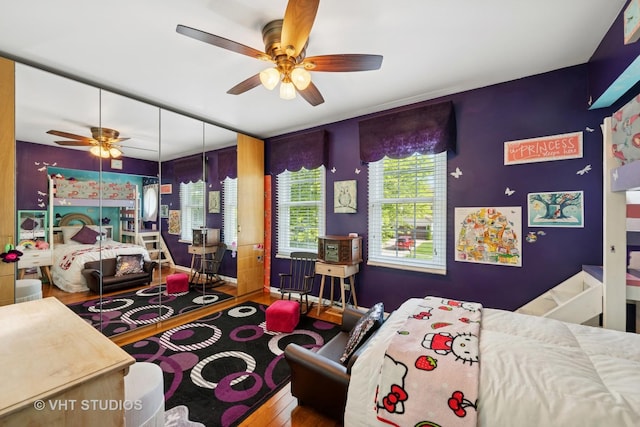 1149 Saddle Ridge Trl, Cary, IL 60013 - bedroom with wood finished floors and a ceiling fan