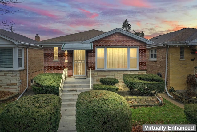 5261 N Natchez Ave, Chicago, IL 60656 - view of front of home featuring brick siding and a shingled roof