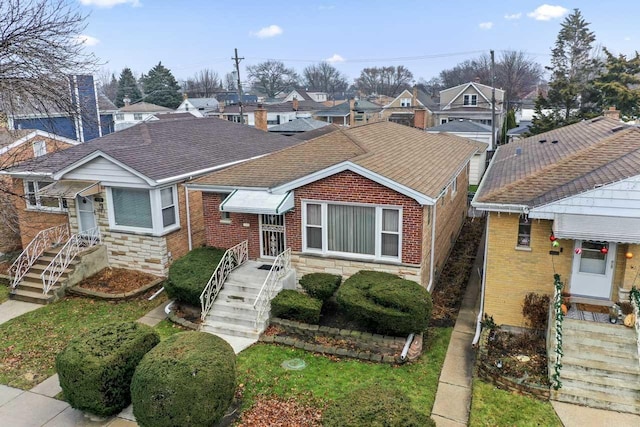 5261 N Natchez Ave, Chicago, IL 60656 - bungalow-style home with a residential view, brick siding, a shingled roof, and stone siding