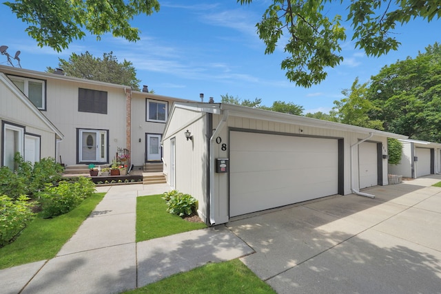 208 Spring Ct, Bloomingdale, IL 60108 - view of front facade featuring concrete driveway