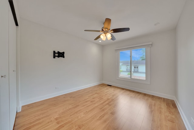208 Spring Ct, Bloomingdale, IL 60108 - empty room with light wood-type flooring and a ceiling fan