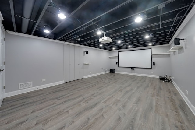 208 Spring Ct, Bloomingdale, IL 60108 - home theater featuring wood finished floors and baseboards