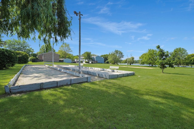 208 Spring Ct, Bloomingdale, IL 60108 - surrounding community with a game area and a lawn