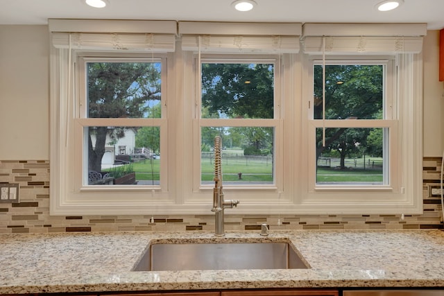 208 Spring Ct, Bloomingdale, IL 60108 - kitchen view of backsplash and light stone counters