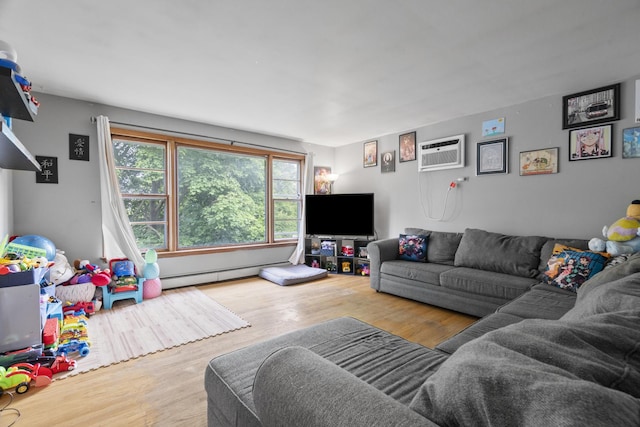 6004 S Keeler Ave, Chicago, IL 60629 - living area featuring a baseboard heating unit, a wall mounted AC, and wood finished floors