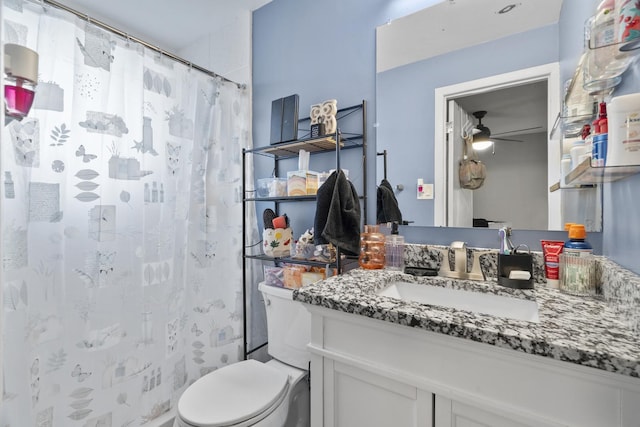 6004 S Keeler Ave, Chicago, IL 60629 - bathroom featuring toilet, vanity, curtained shower, and a ceiling fan