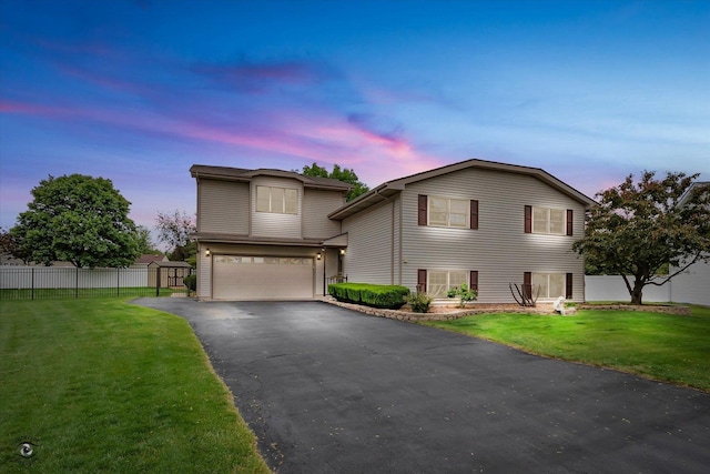 711 Lake Ct, New Lenox, IL 60451 - traditional home with a garage and asphalt driveway