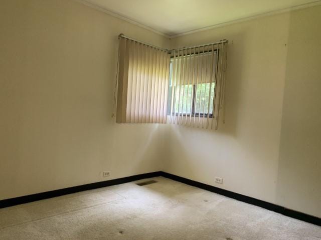 323 Windsor St, Park Forest, IL 60466 - carpeted spare room with ornamental molding and baseboards