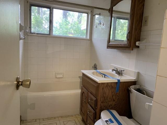 323 Windsor St, Park Forest, IL 60466 - bathroom with toilet, vanity, tile walls, shower / washtub combination, and tile patterned floors