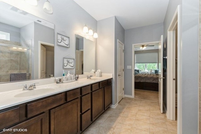 1033 Carolina Ct, Pingree Grove, IL 60140 - ensuite bathroom with double vanity, a stall shower, and tile patterned floors