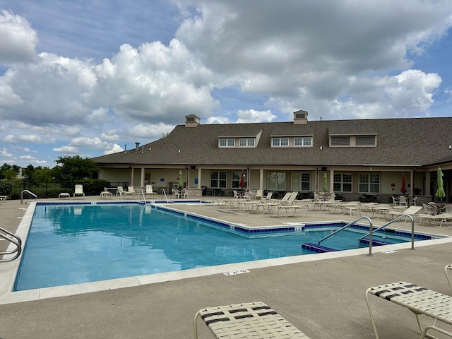 1033 Carolina Ct, Pingree Grove, IL 60140 - community pool featuring a patio