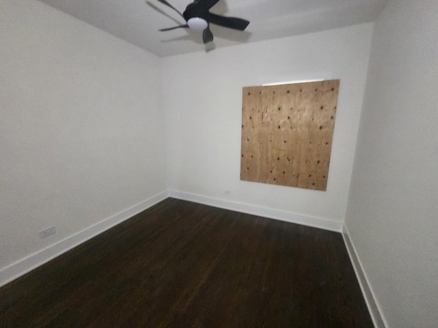 12416 S Carpenter St, Calumet Park, IL 60827 - empty room with dark wood-type flooring, baseboards, and ceiling fan