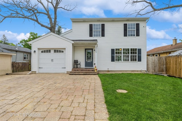 25785 W Hillside Ave, Ingleside, IL 60041 - traditional home featuring an attached garage and decorative driveway