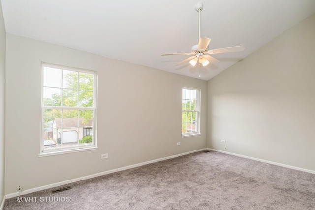 25785 W Hillside Ave, Ingleside, IL 60041 - empty room featuring plenty of natural light, carpet floors, ceiling fan, baseboards, and lofted ceiling