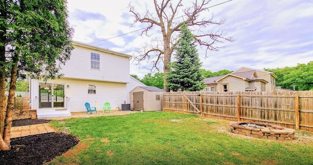 25785 W Hillside Ave, Ingleside, IL 60041 - view of yard featuring central AC unit and an outdoor fire pit