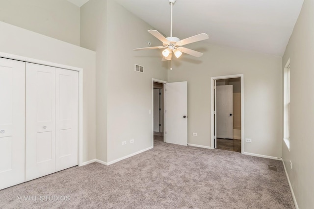 25785 W Hillside Ave, Ingleside, IL 60041 - unfurnished bedroom with carpet, high vaulted ceiling, a closet, baseboards, and ceiling fan