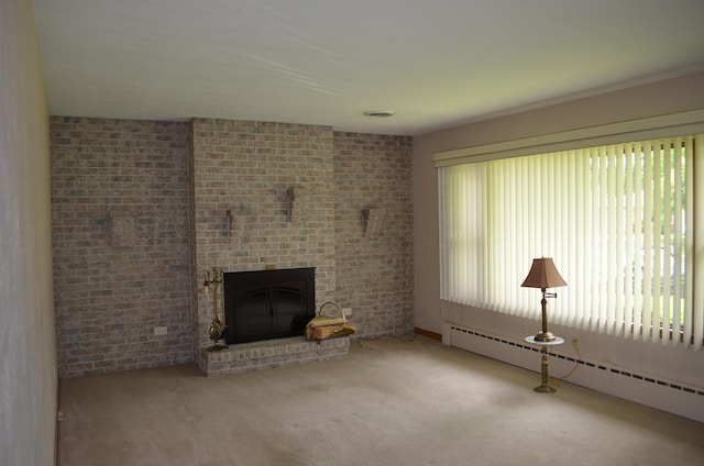3127 Jo Ann Dr, Joliet, IL 60431 - unfurnished living room with a baseboard radiator, carpet flooring, and a brick fireplace