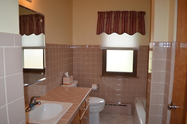 3127 Jo Ann Dr, Joliet, IL 60431 - bathroom with a baseboard heating unit, tile walls, tile patterned flooring, toilet, and vanity
