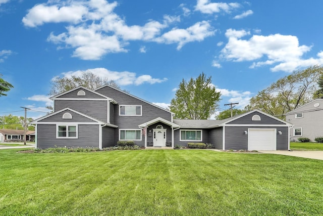 3205 Meadow Dr, Rolling Meadows, IL 60008 - traditional home with concrete driveway, a front yard, and a garage