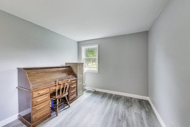 3205 Meadow Dr, Rolling Meadows, IL 60008 - home office featuring baseboards and wood finished floors