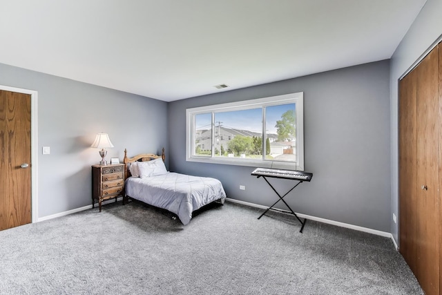 3205 Meadow Dr, Rolling Meadows, IL 60008 - carpeted bedroom featuring a closet and baseboards