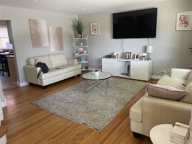 549 E Lincoln St Unit 549, Mount Prospect, IL 60056 - living room featuring wood finished floors, baseboards, and recessed lighting